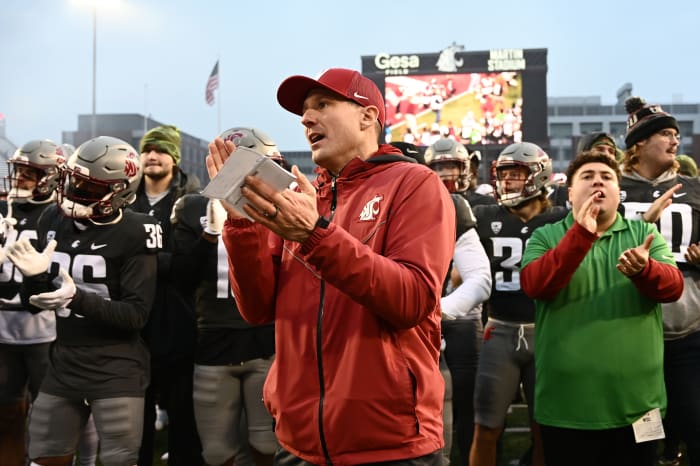 Nov 12, 2022; Pullman, Washington, USA; Washington State Cougars head coach Jake Dickert sings the school fight song after a game against the Arizona State Sun Devils at Gesa Field at Martin Stadium. Washington State won 28-18. Mandatory Credit: James Snook-USA TODAY Sports